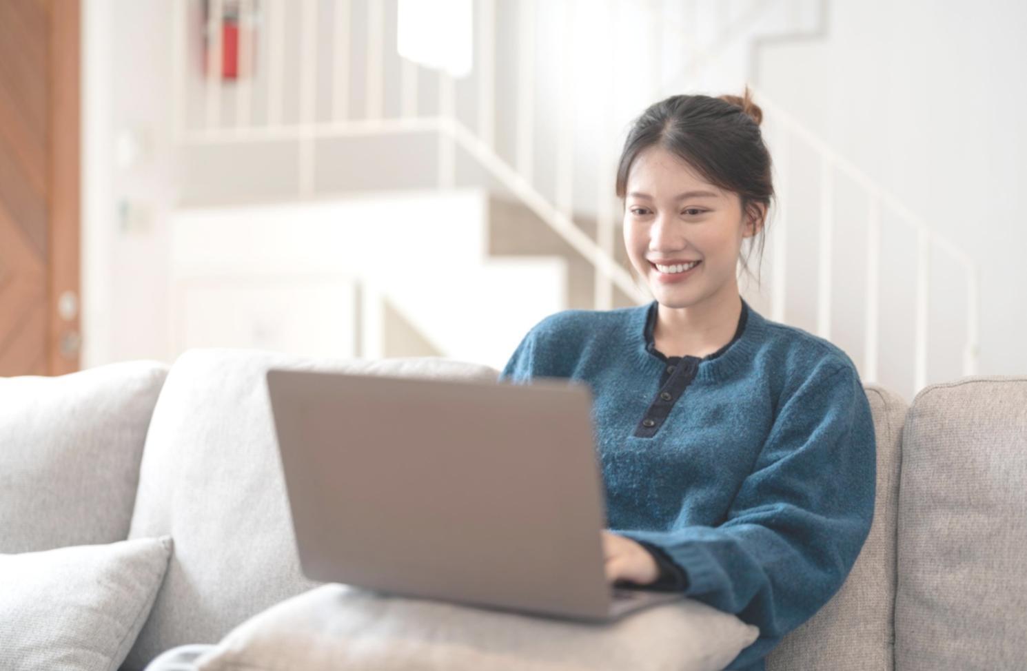 Students collaborating on user experience design projects in modern learning environment